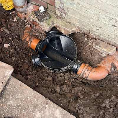 Manhole installation, underground pipe connection